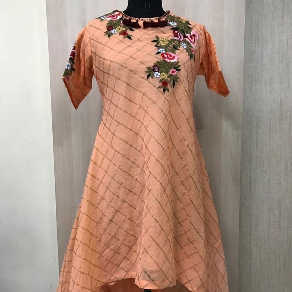 Fancy designer self weave banarsi designer kurti  with thread work and tassels.